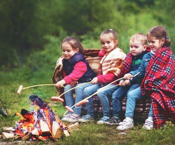 Children Enjoying a Campfire